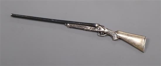 A modern silver miniature model of a double barrelled shotgun, maker HW, 14.1cm.